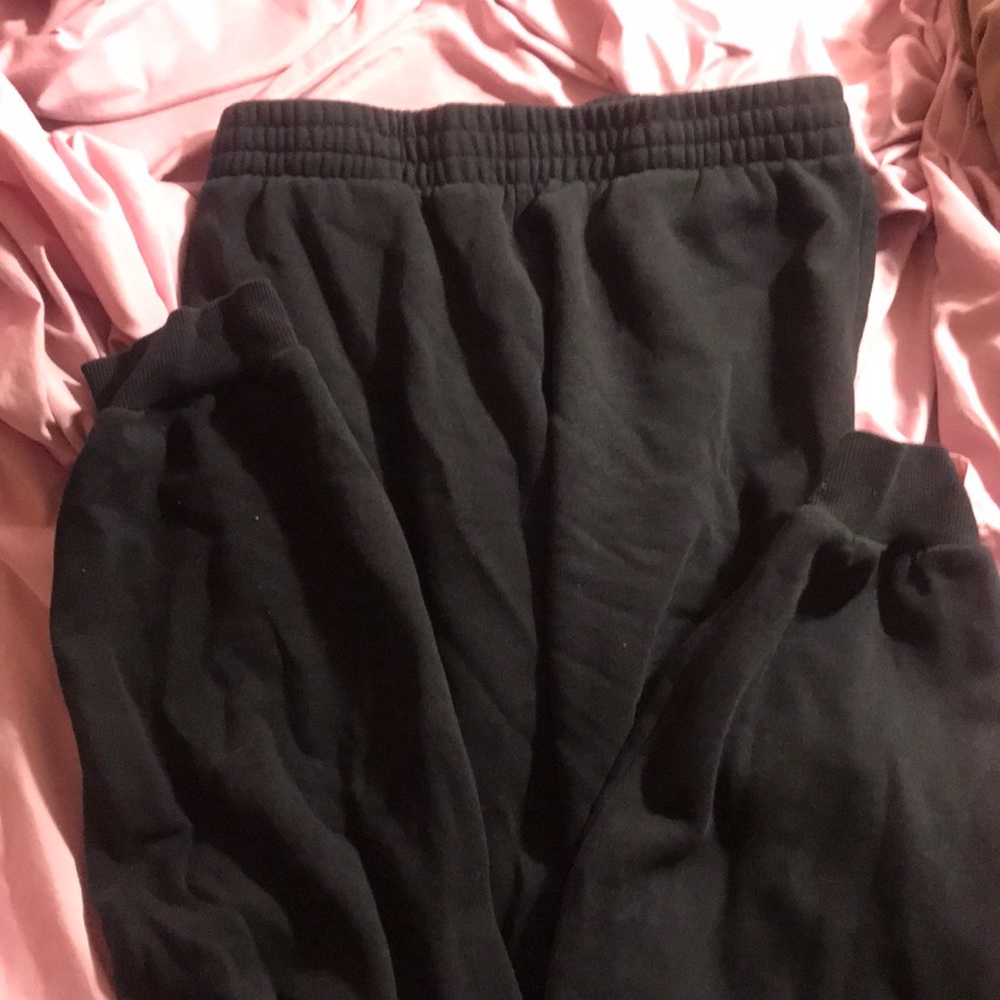 black champion sweatpants with worded leg